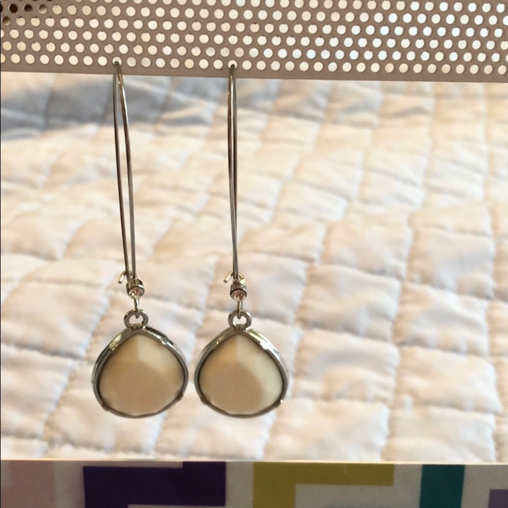 Dangle earrings with white dangle